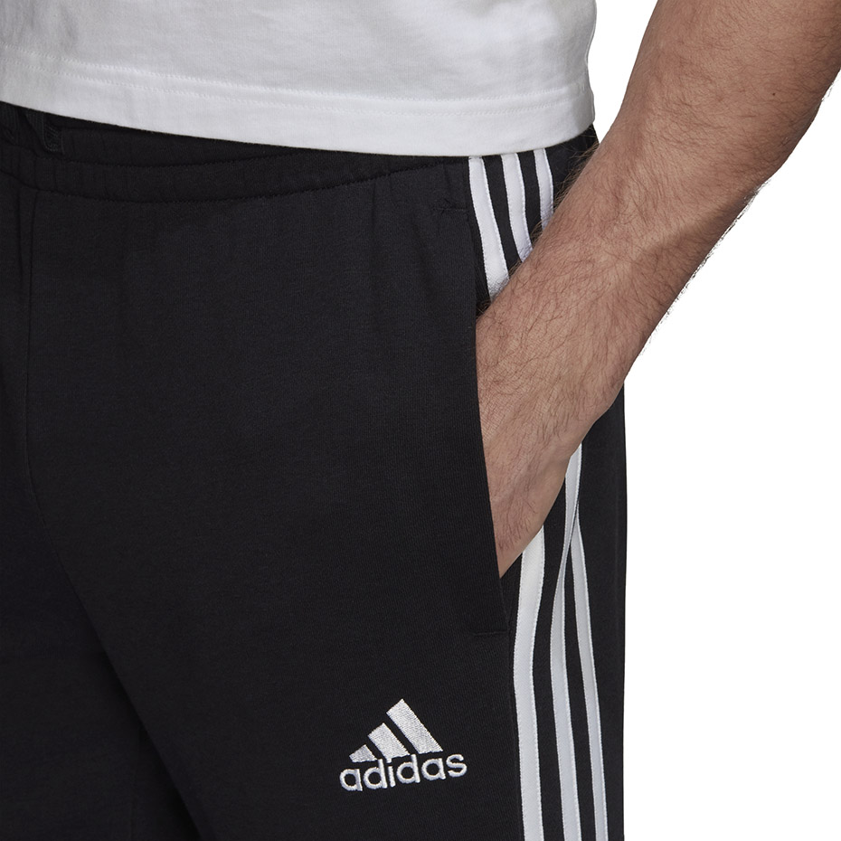 Spodnie męskie adidas Essentials Tapered Elasticcuff 3 Stripes Pant czarne – ujęcie 6