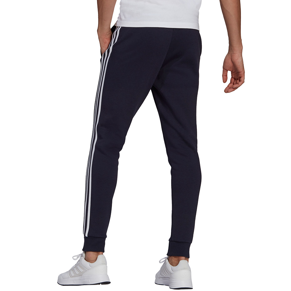 Spodnie męskie adidas Essentials Fleece Tapered Cuff 3-Band Pants granatowe – ujęcie 4