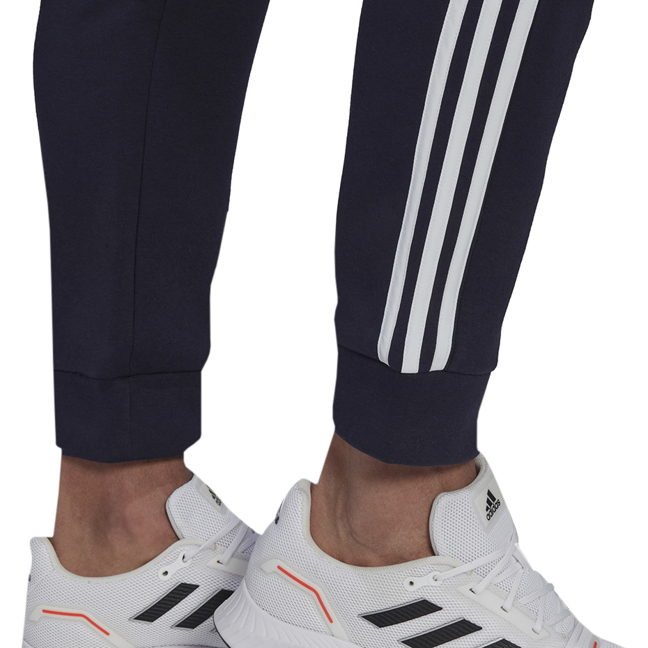 Spodnie męskie adidas Essentials Colorblock Fleece granatowe – ujęcie 4