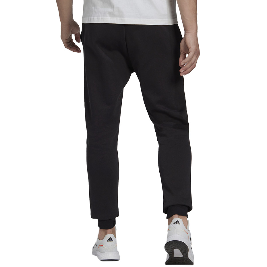 Spodnie męskie adidas Essentials Fleece Regular Tapered czarne – ujęcie 3
