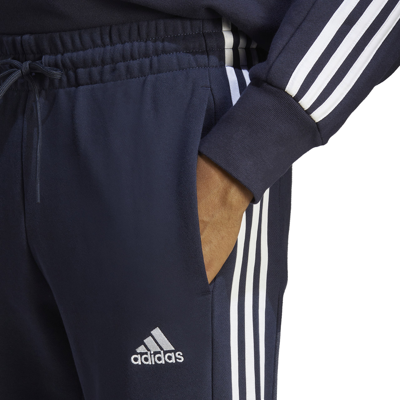Spodnie męskie adidas Essentials French Terry Tapered Cuff 3-Stripes granatowe – ujęcie 5